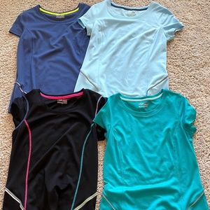 Bundle of 4 Fila Sport Brand Athletic short sleeve shirts